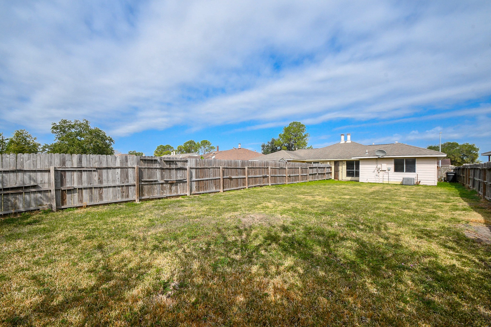 5411 Regal Ridge Lane Houston, TX 77053 - Photo 19 of 20 a view of a house with a yard and sitting area