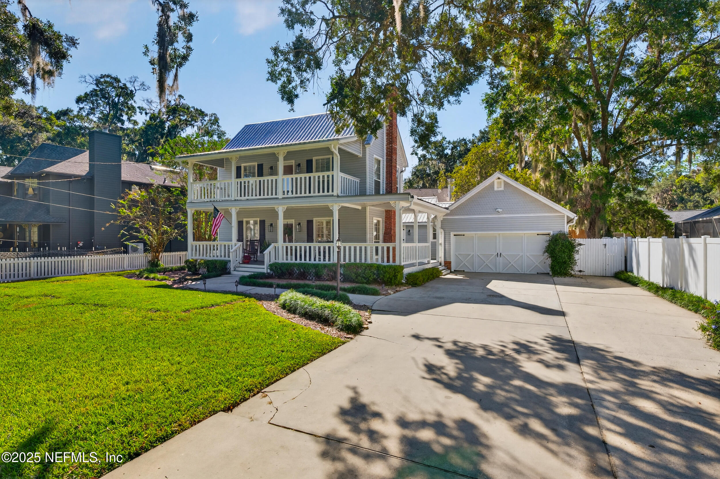 2734 Loretto Road Jacksonville, FL 32223 - Photo 1 of 35 a front view of a house with garden