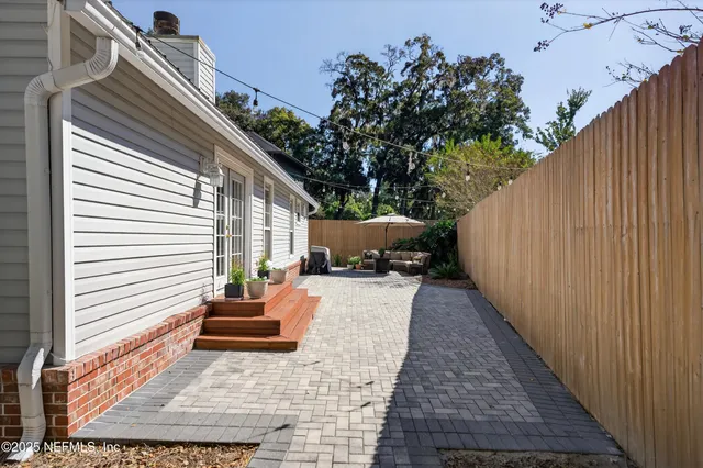 a house view with a backyard space