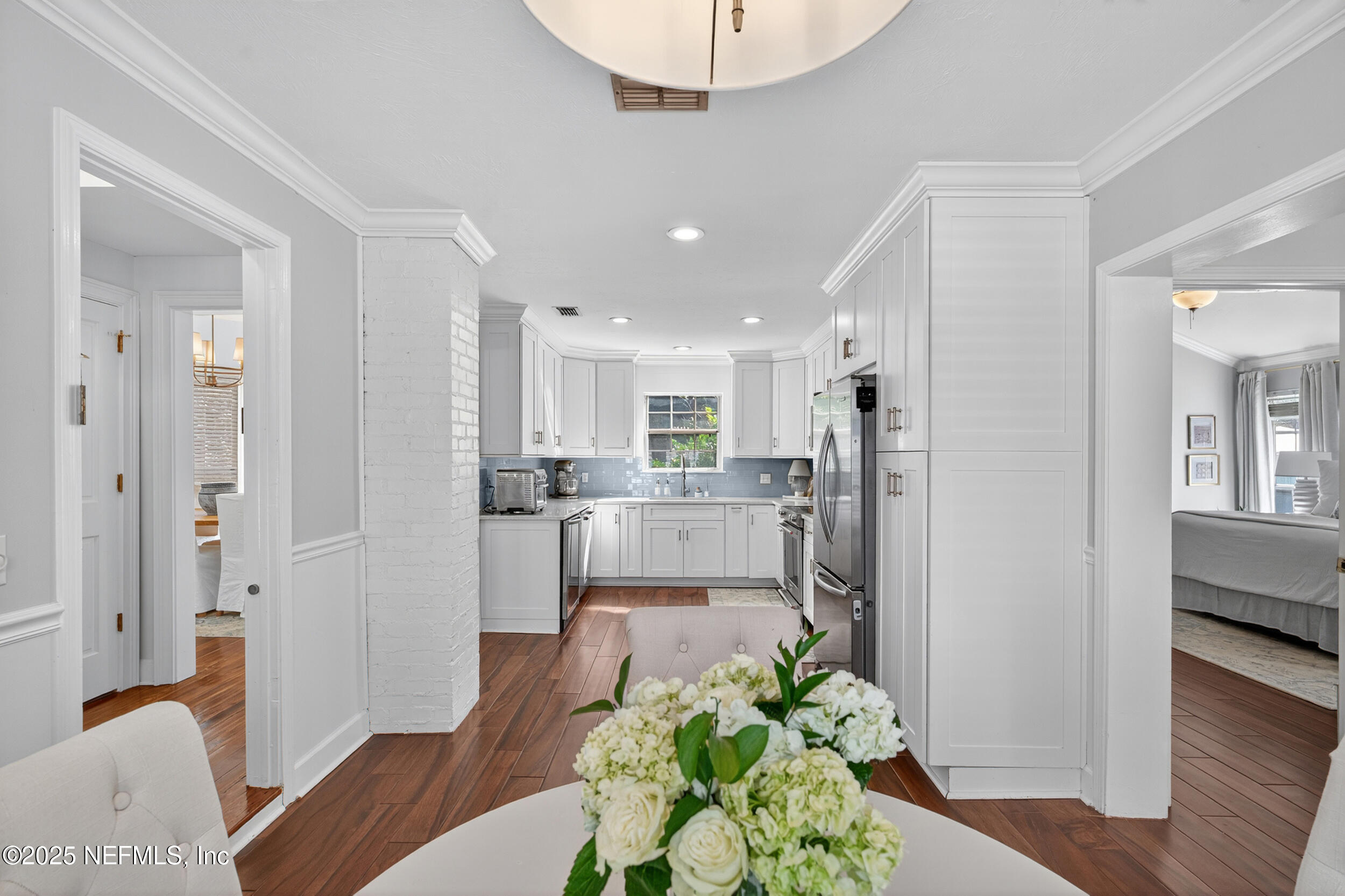 2734 Loretto Road Jacksonville, FL 32223 - Photo 6 of 35 a living room with stainless steel appliances furniture wooden floor and a view of kitchen
