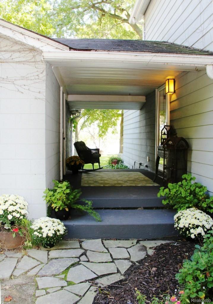 47008 Denton Road Belleville, MI 48111 - Photo 5 of 44 Charming Covered Breezeway between House & Garage