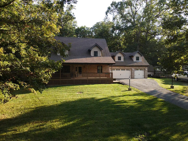 5705 Timber Lane West Monee, IL 60449 - Photo 1 of 52 a front view of a house with a yard