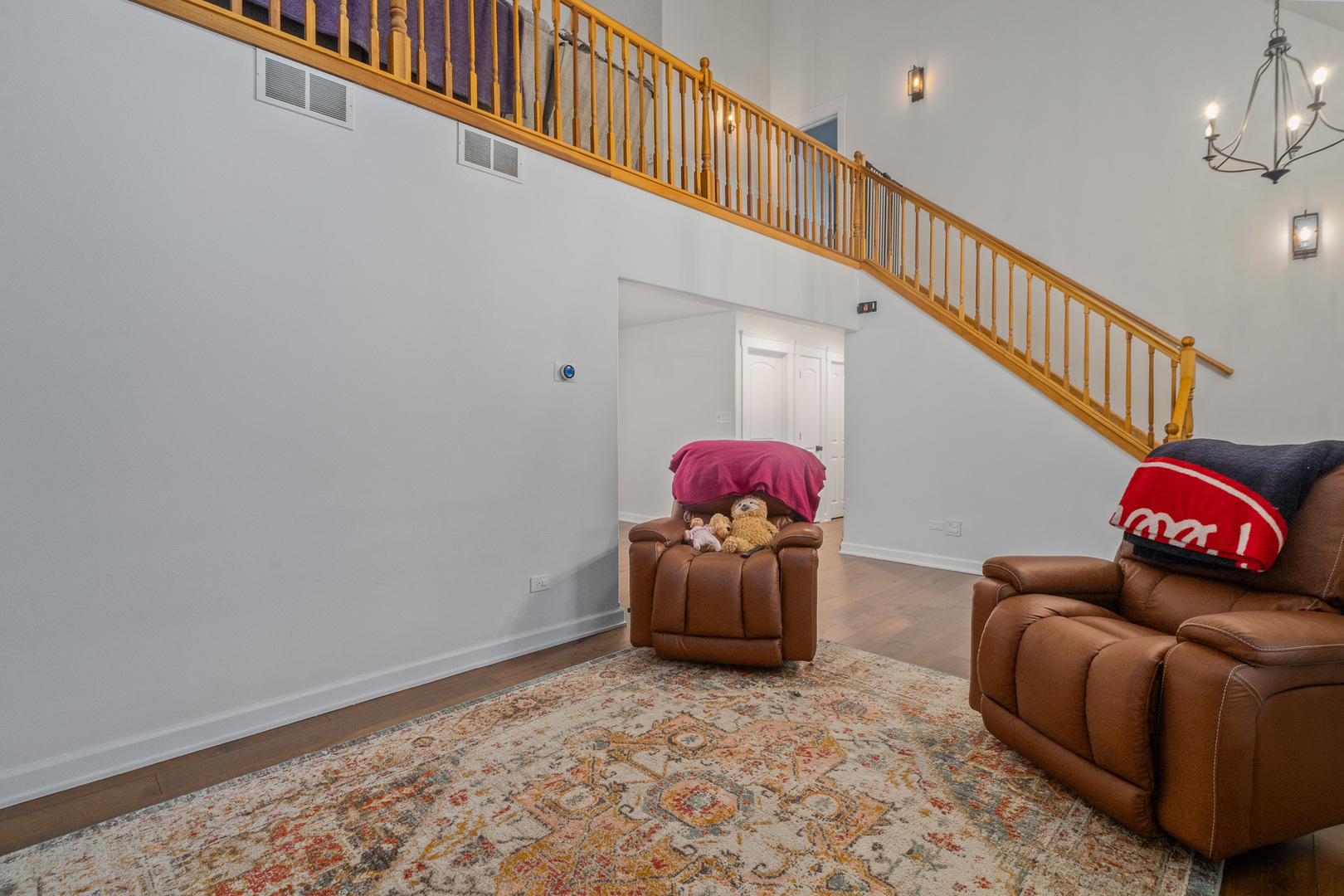 5705 Timber Lane West Monee, IL 60449 - Photo 11 of 52 a living room with furniture and stairs