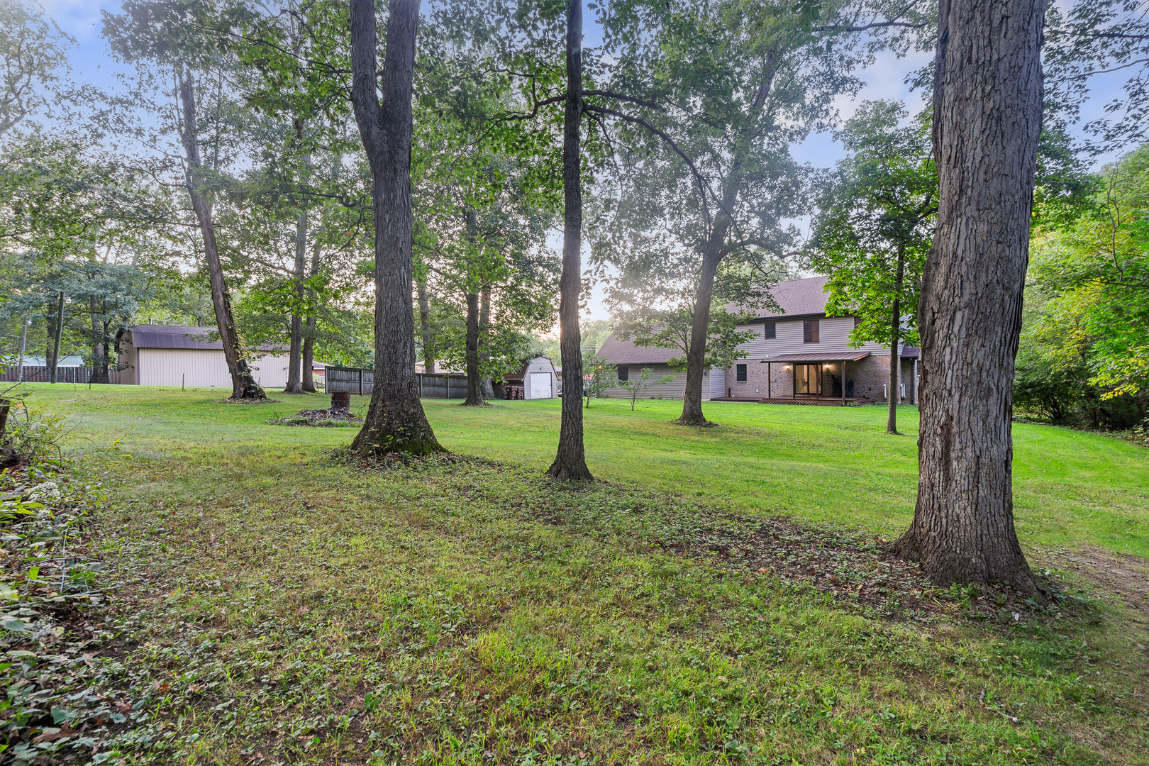 5705 Timber Lane West Monee, IL 60449 - Photo 24 of 52 a backyard of a house with lots of green space
