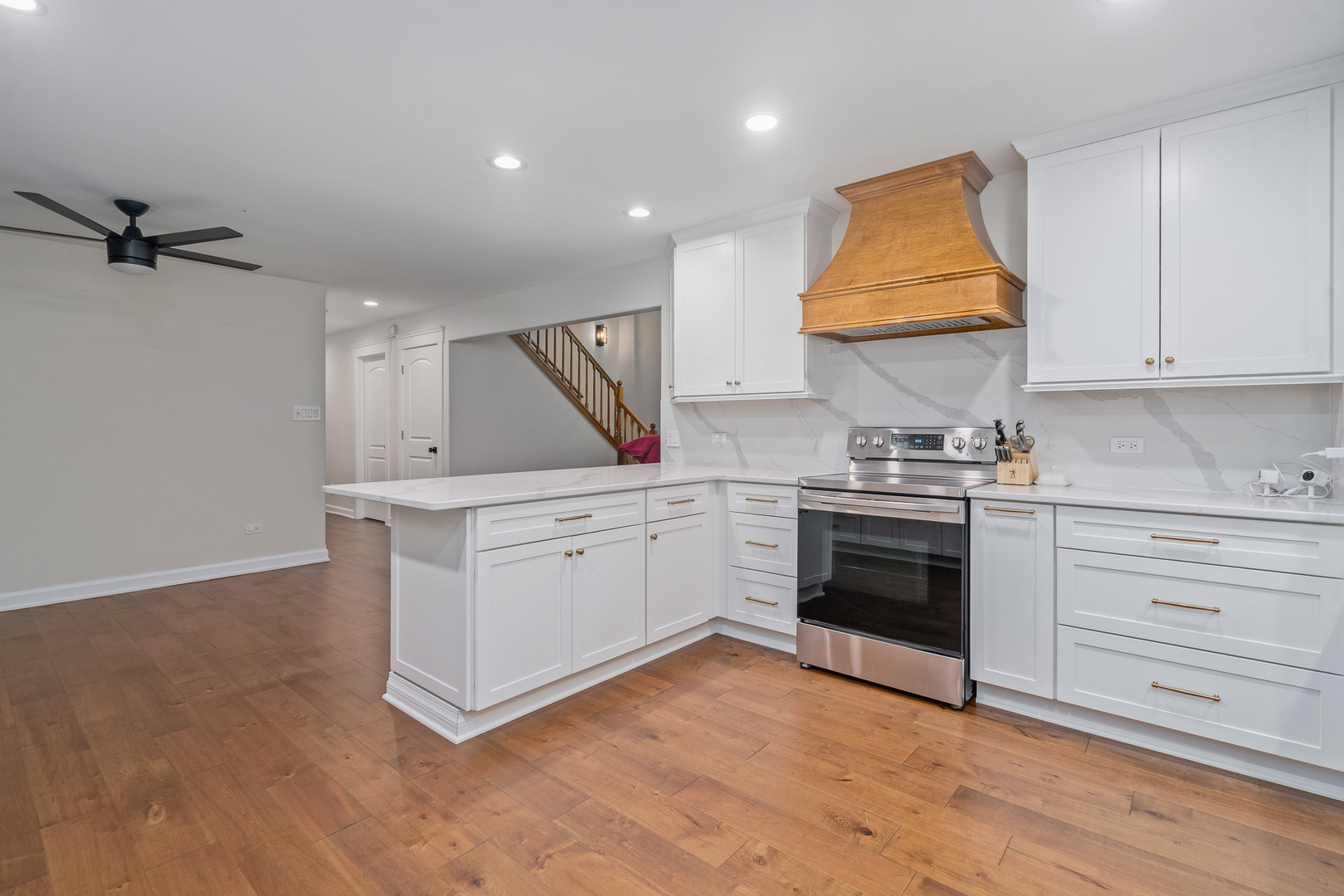 5705 Timber Lane West Monee, IL 60449 - Photo 3 of 52 a kitchen with granite countertop a stove and a sink