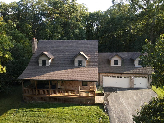 5705 Timber Lane West Monee, IL 60449 - Photo 47 of 52 a front view of a house with garden