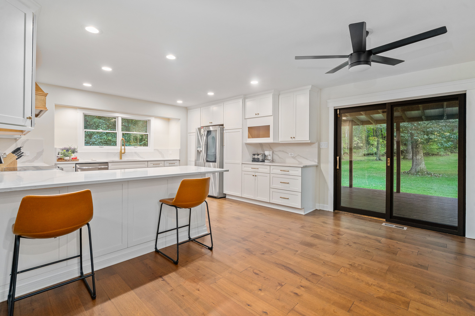 5705 Timber Lane West Monee, IL 60449 - Photo 6 of 52 a kitchen with stainless steel appliances granite countertop a stove a sink and a refrigerator