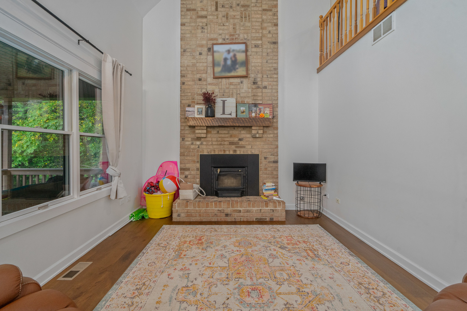 5705 Timber Lane West Monee, IL 60449 - Photo 8 of 52 a living room with furniture and a fireplace