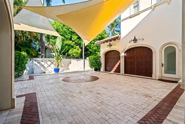 a view of a wooden door of the house