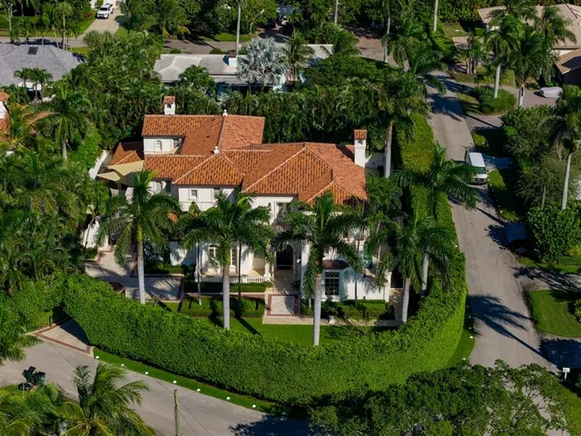 an aerial view of a house with a garden