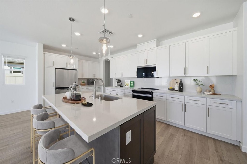 44273 Homestead Street Lancaster, CA 93535 - Photo 4 of 28 PHOTOS ARE OF MODEL MATCH AND HAVE BEEN VIRTUALLY STAGED - EXTERIOR AND INTERIOR FINISHES MAY VARY