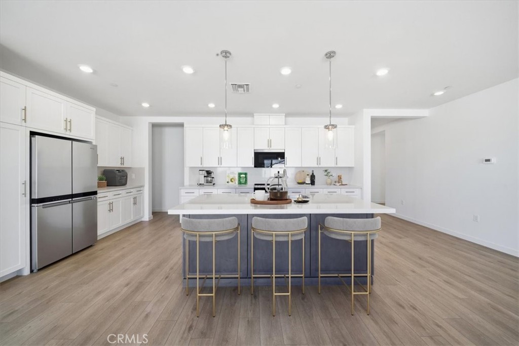 44273 Homestead Street Lancaster, CA 93535 - Photo 5 of 28 PHOTOS ARE OF MODEL MATCH AND HAVE BEEN VIRTUALLY STAGED - EXTERIOR AND INTERIOR FINISHES MAY VARY