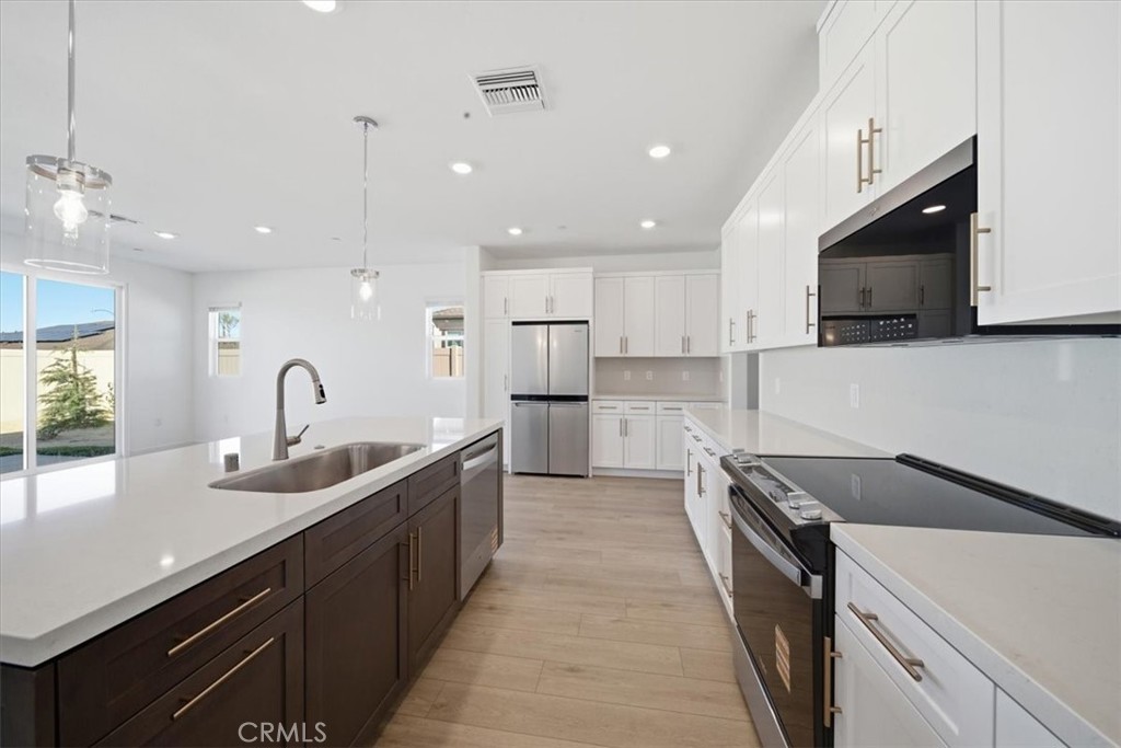 44273 Homestead Street Lancaster, CA 93535 - Photo 7 of 28 PHOTOS ARE OF MODEL MATCH AND HAVE BEEN VIRTUALLY STAGED - EXTERIOR AND INTERIOR FINISHES MAY VARY