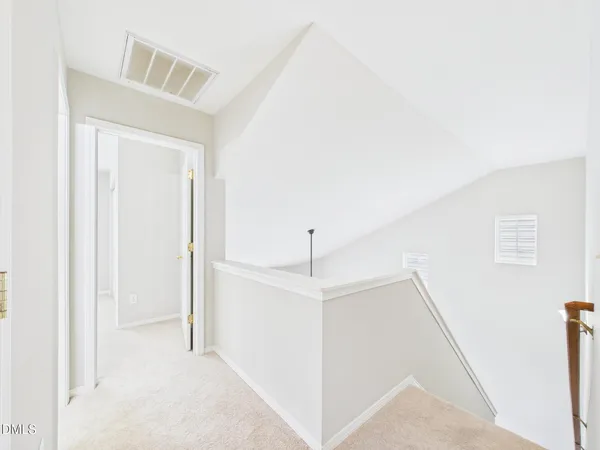 a view of a room that has a window in it