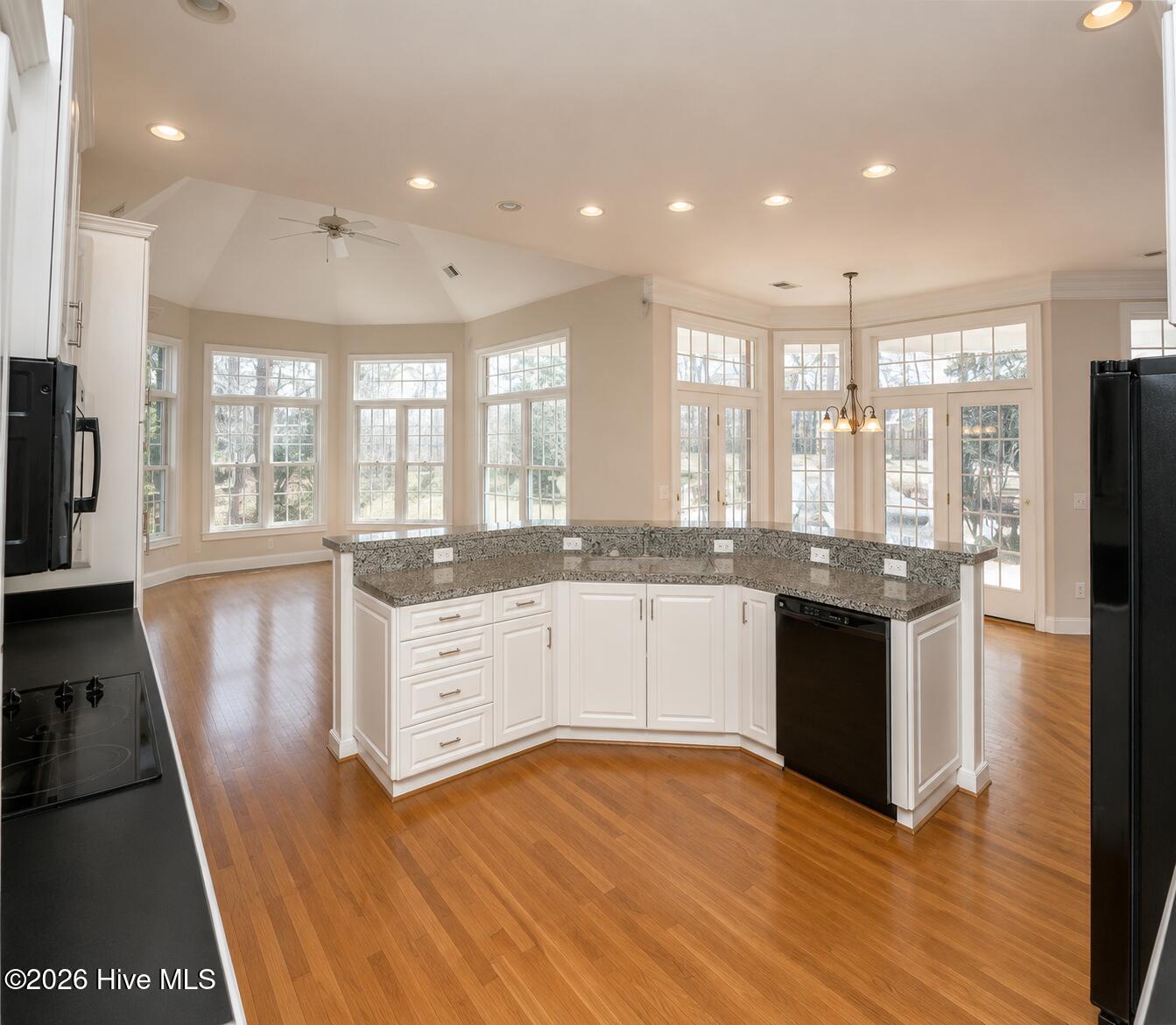 523 Candlewick Lane Southwest Ocean Isle Beach, NC 28469 - Photo 13 of 85 Kitchen views to Den
