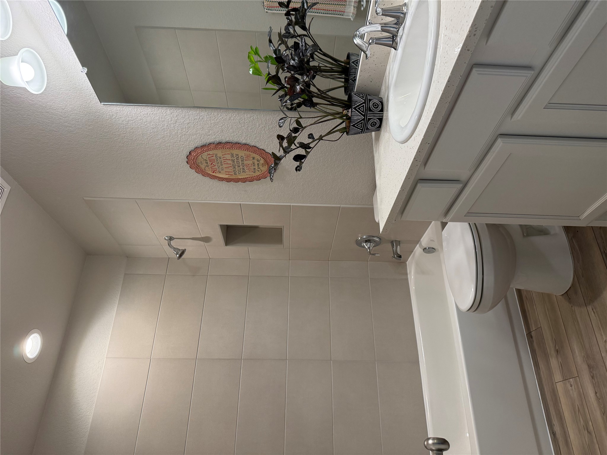 2336 Hagerman Road Conroe, TX 77384 - Photo 9 of 35 a bathroom with a sink and a mirror