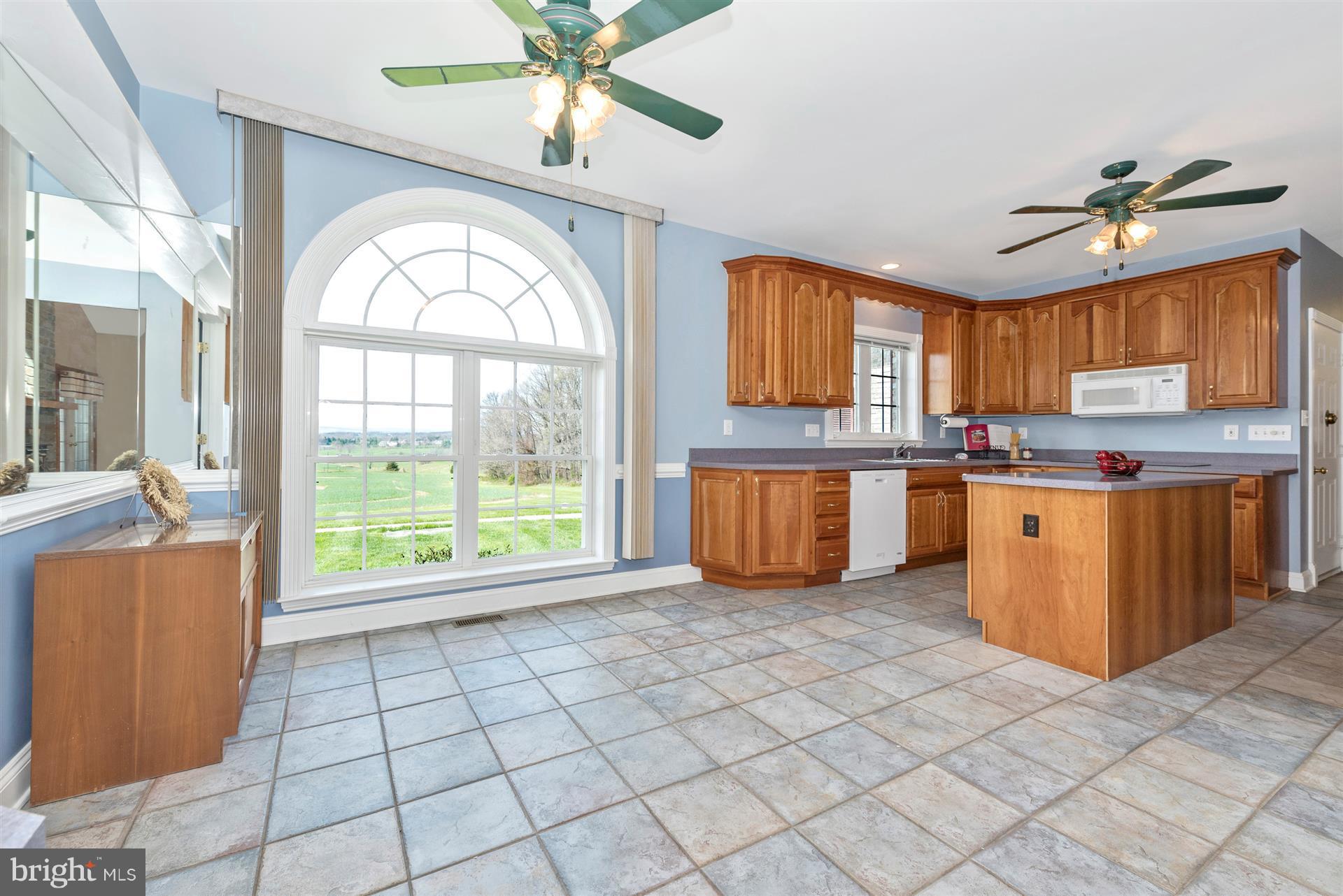 6445 New London Road New Market, MD 21774 - Photo 8 of 30 Kitchen Breakfast Area with Sun Burst Window