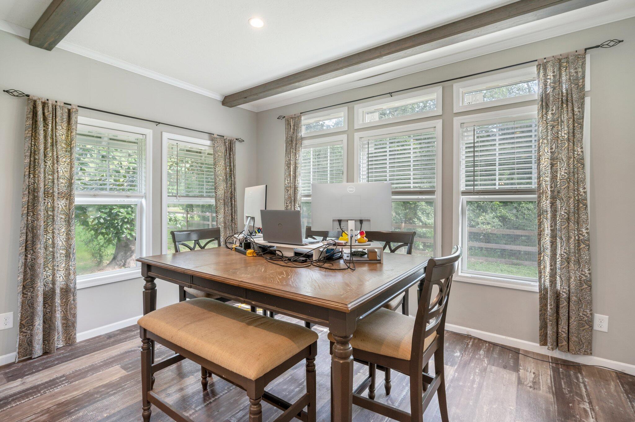 5979 Old River Road Baker, FL 32531 - Photo 16 of 46 a view of a workspace with furniture and a window