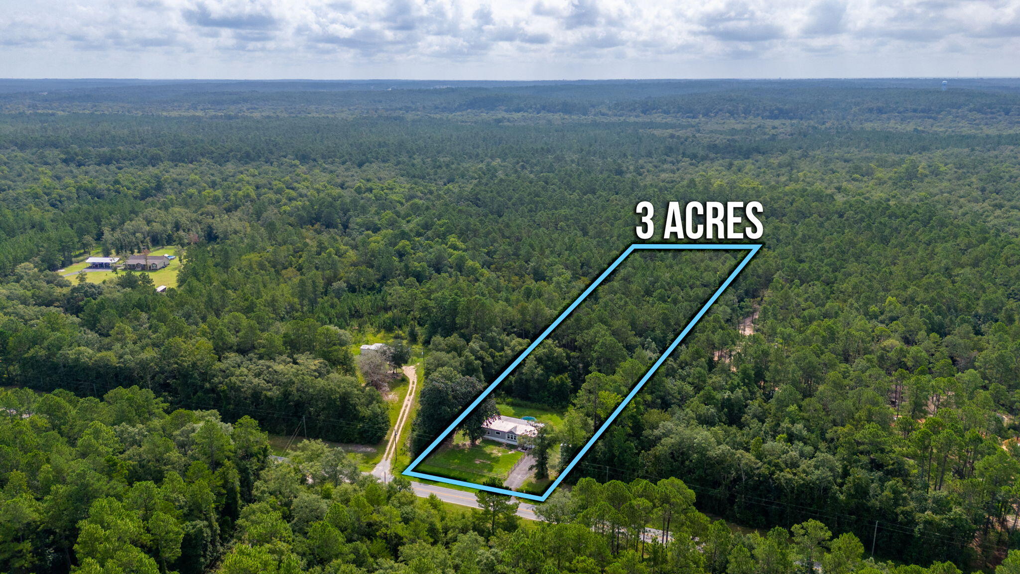 5979 Old River Road Baker, FL 32531 - Photo 40 of 46 a view of a tennis court