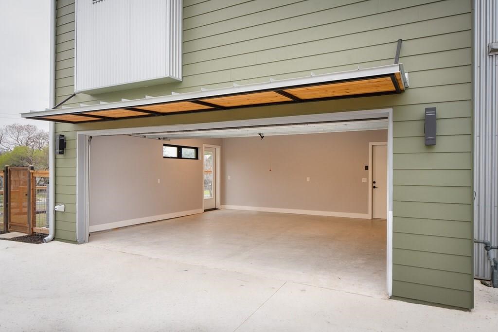 2117 Pershing Drive Austin, TX 78723 - Photo 20 of 30 Two car attached garage, will open to the kitchen.