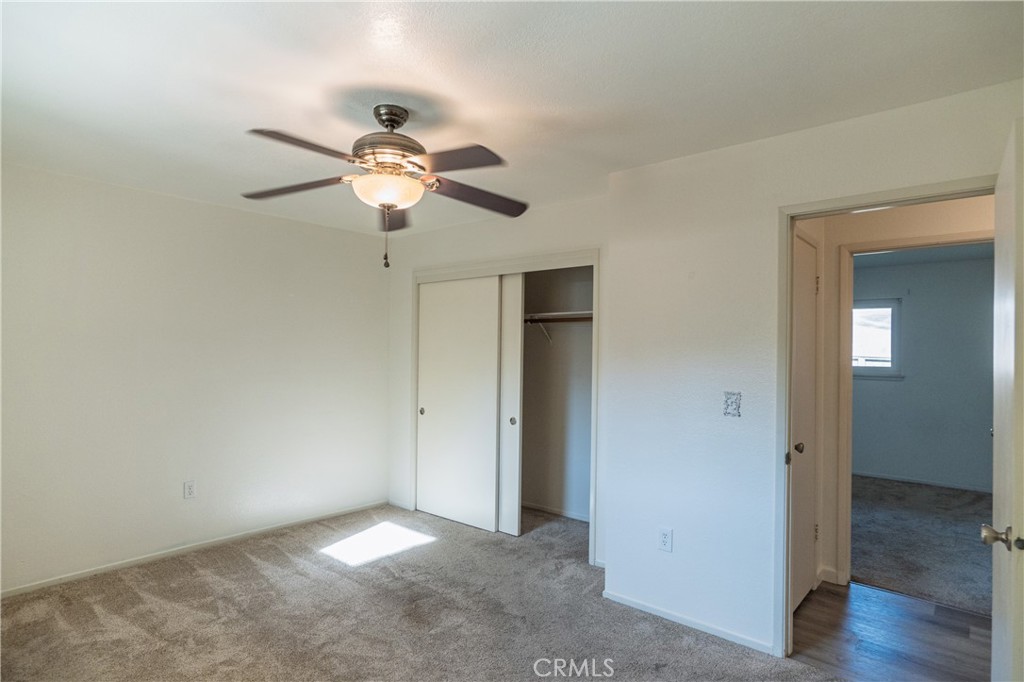 749 Junipero Court Merced, CA 95348 - Photo 23 of 57 a view of an empty room and wooden floor