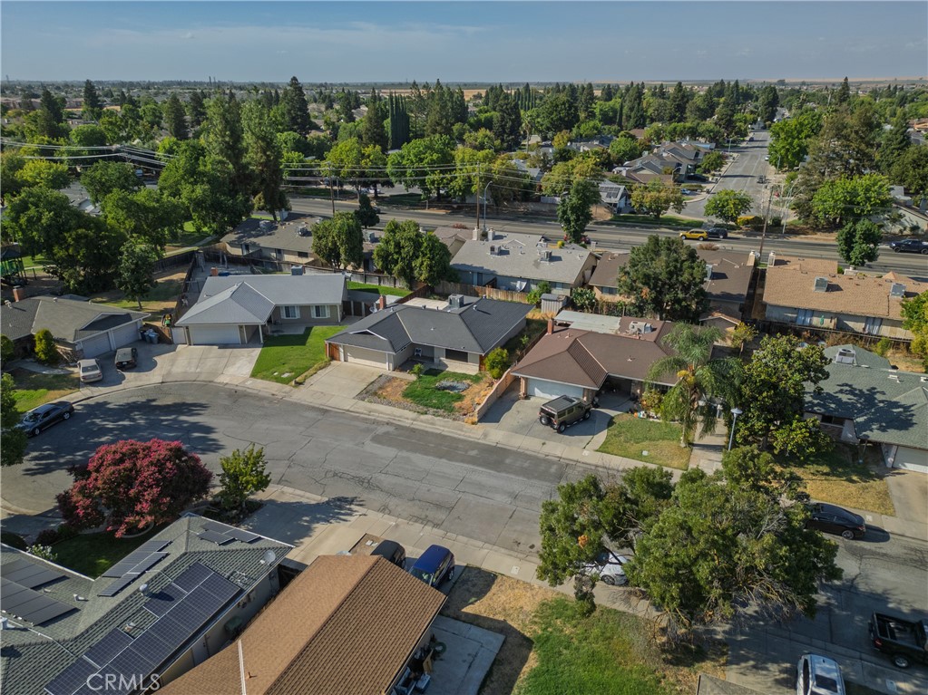 749 Junipero Court Merced, CA 95348 - Photo 37 of 57 an aerial view of multiple houses with yard