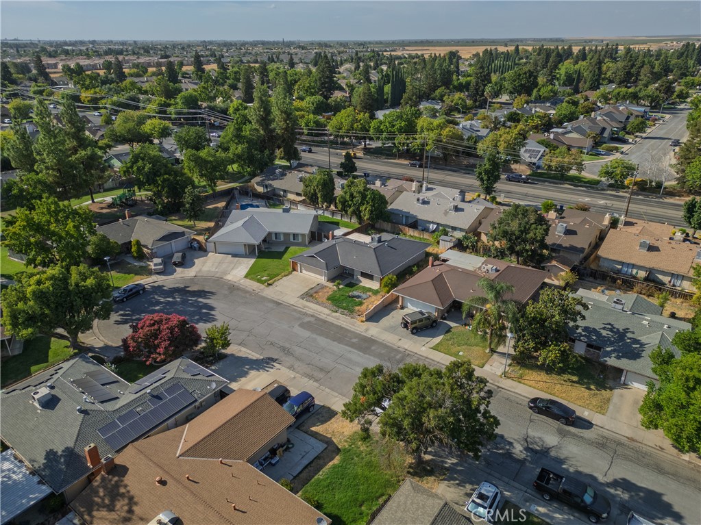 749 Junipero Court Merced, CA 95348 - Photo 38 of 57 an aerial view of a house with a garden