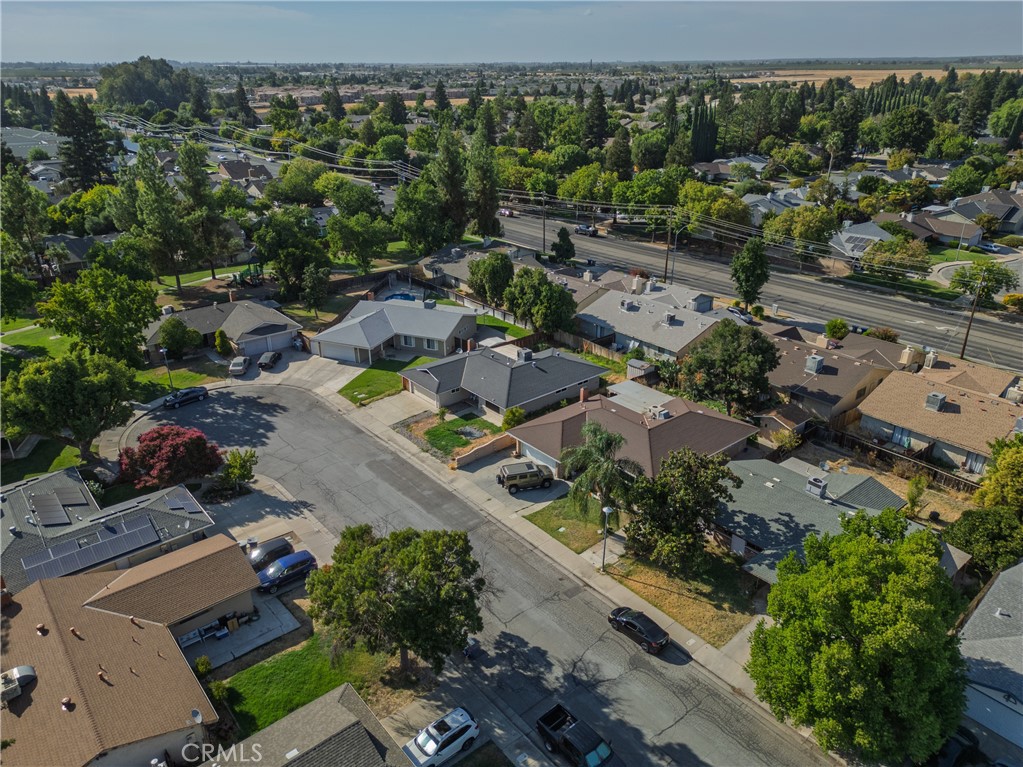 749 Junipero Court Merced, CA 95348 - Photo 39 of 57 an aerial view of a city with lots of residential buildings