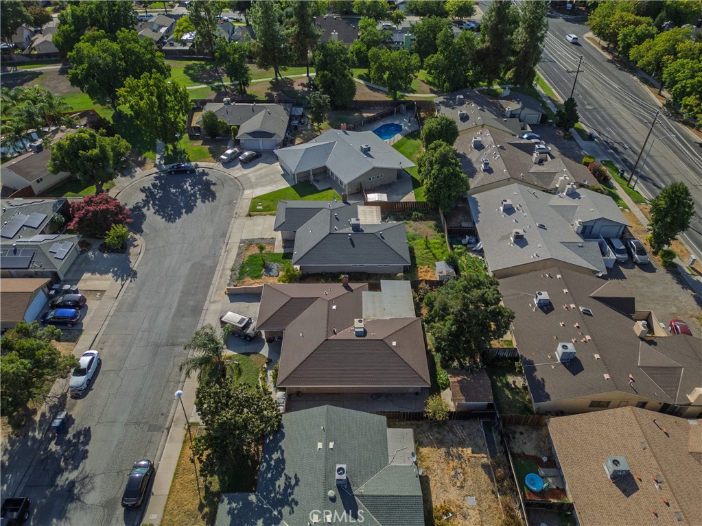 749 Junipero Court Merced, CA 95348 - Photo 41 of 57 an aerial view of multiple houses with yard