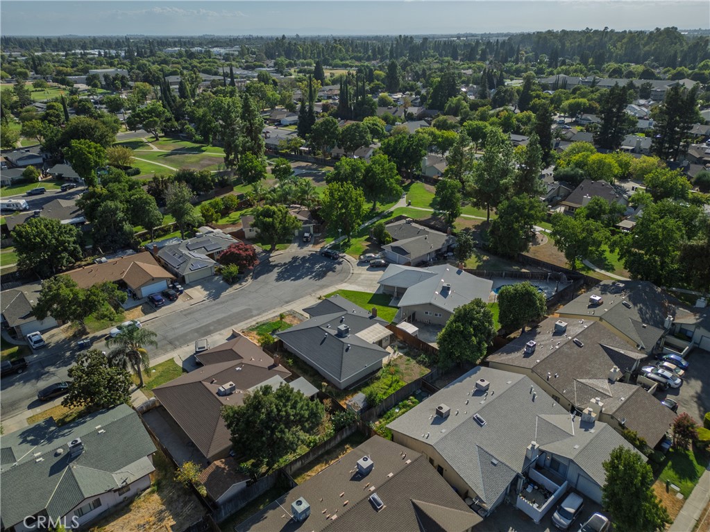 749 Junipero Court Merced, CA 95348 - Photo 44 of 57 an aerial view of a city with lots of residential buildings