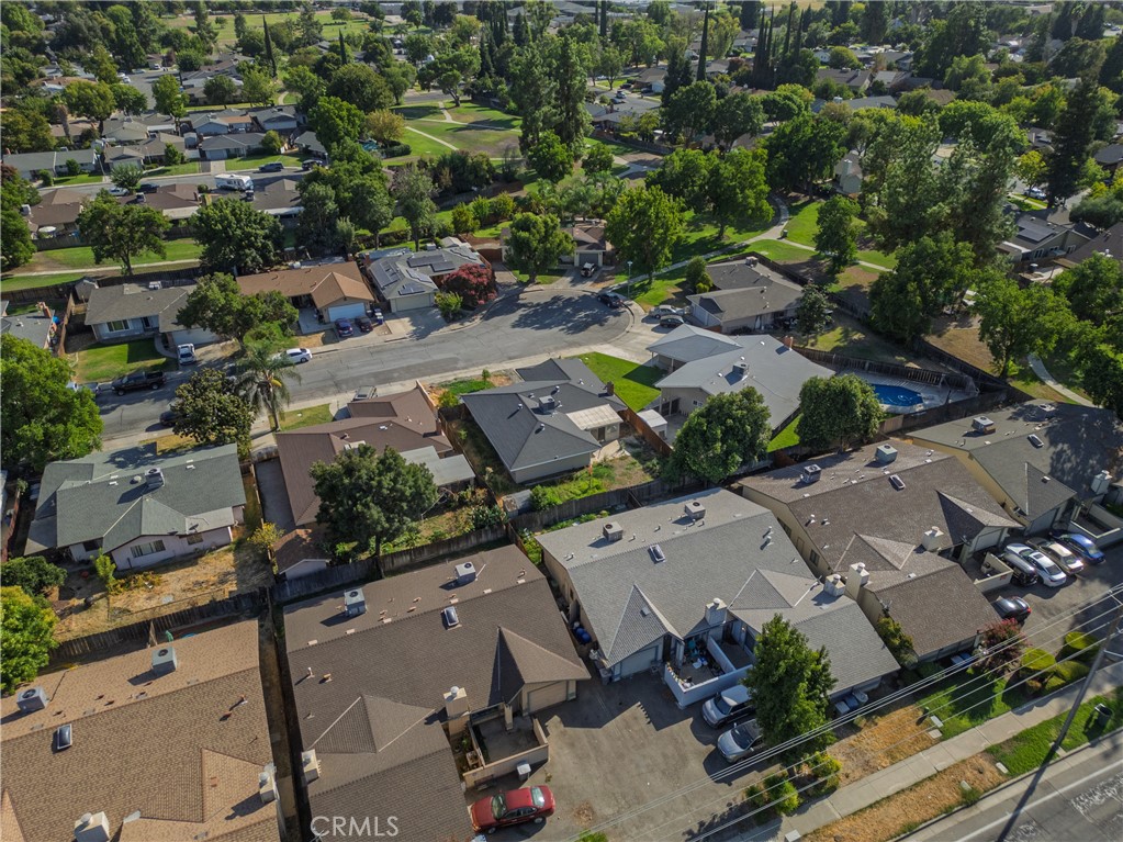 749 Junipero Court Merced, CA 95348 - Photo 45 of 57 an aerial view of a city with lots of residential buildings