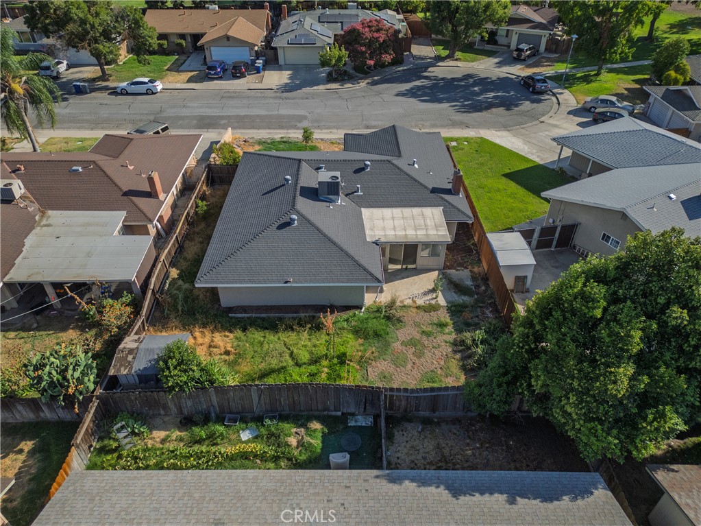 749 Junipero Court Merced, CA 95348 - Photo 48 of 57 an aerial view of a house with a garden