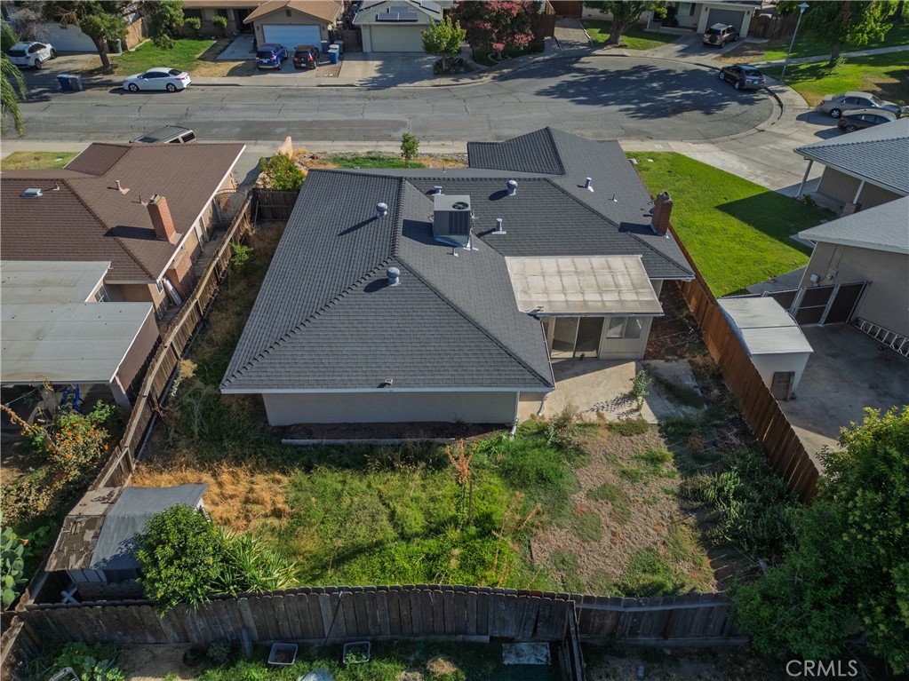 749 Junipero Court Merced, CA 95348 - Photo 49 of 57 an aerial view of a house with a yard basket ball court and outdoor seating