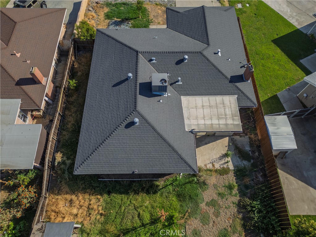 749 Junipero Court Merced, CA 95348 - Photo 50 of 57 an aerial view of a house with a yard