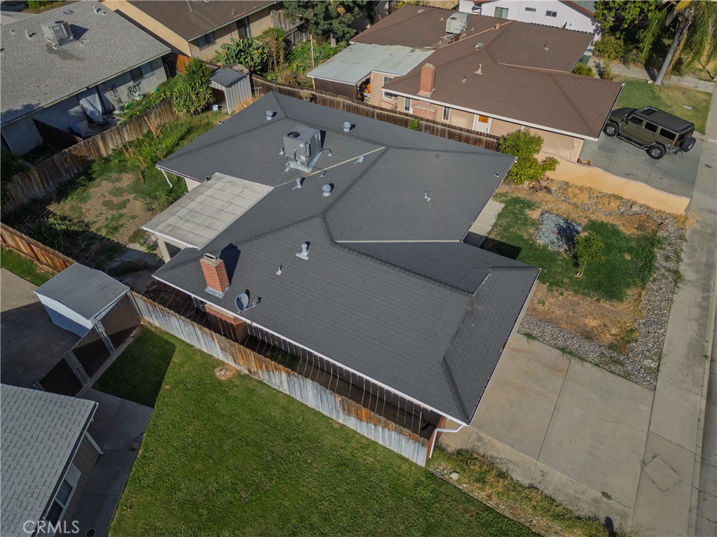 749 Junipero Court Merced, CA 95348 - Photo 56 of 57 an aerial view of residential houses with outdoor space