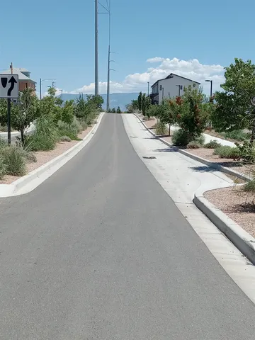 a view of a street with a building