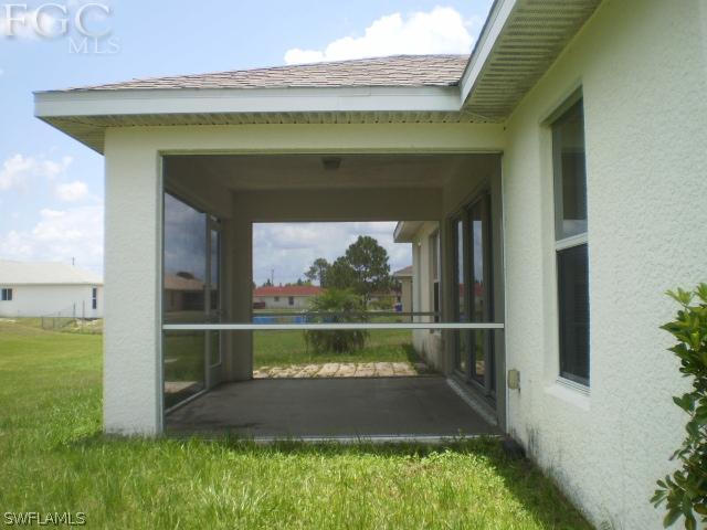 640 Homestead Road South Lehigh Acres, FL 33974 - Photo 19 of 21 a view of outdoor space and yard