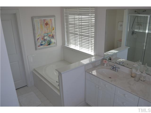1170 Haynes Street Raleigh, NC 27604 - Photo 10 of 19 Deep jacuzzi tub, separate shower, and double vanity Master Bedroom