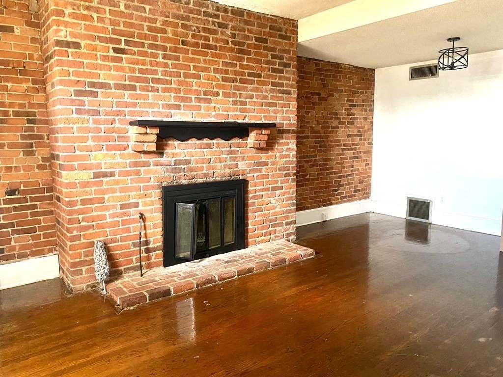 70 Temple Street, Unit 4 Springfield, MA 01105 - Photo 2 of 8 a view of empty room with a fireplace