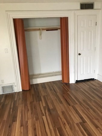 70 Temple Street, Unit 4 Springfield, MA 01105 - Photo 6 of 8 a view of front door with wooden floor