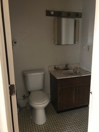 70 Temple Street, Unit 4 Springfield, MA 01105 - Photo 7 of 8 a bathroom with a sink and a toilet
