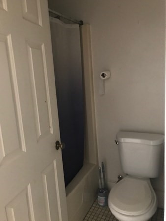 70 Temple Street, Unit 4 Springfield, MA 01105 - Photo 8 of 8 a white toilet sitting next to a shower
