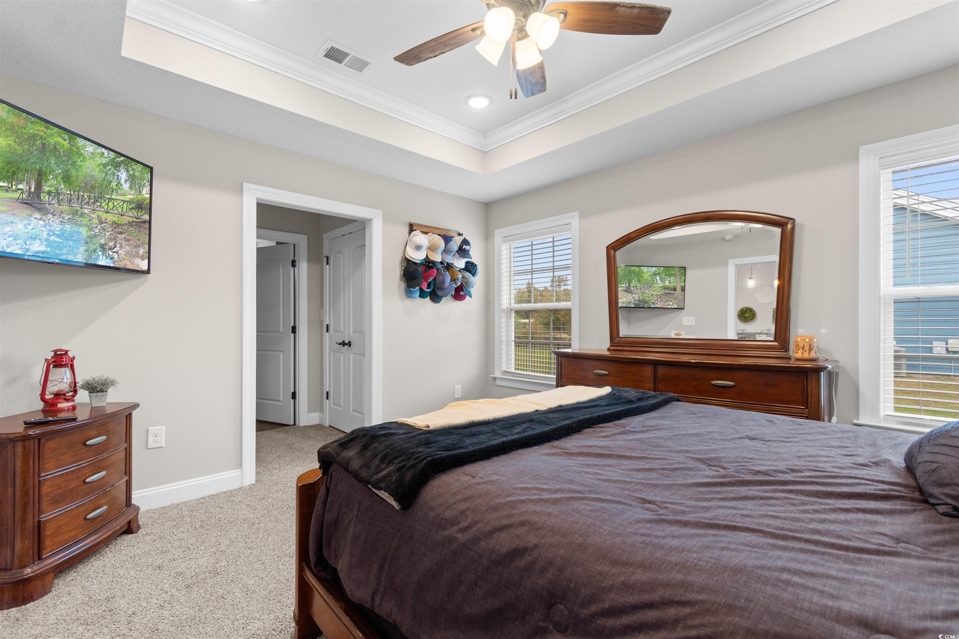 3753 Edwards Road Aynor, SC 29544 - Photo 16 of 38 Carpeted bedroom featuring crown molding, a tray ceiling, ceiling fan, and recessed lighting