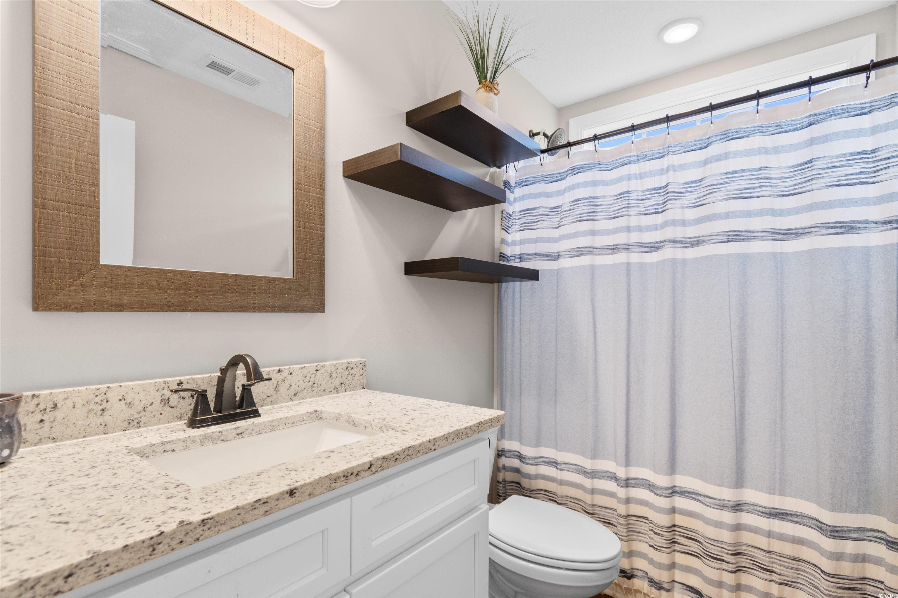 3753 Edwards Road Aynor, SC 29544 - Photo 21 of 38 Full bathroom featuring a shower with shower curtain and vanity