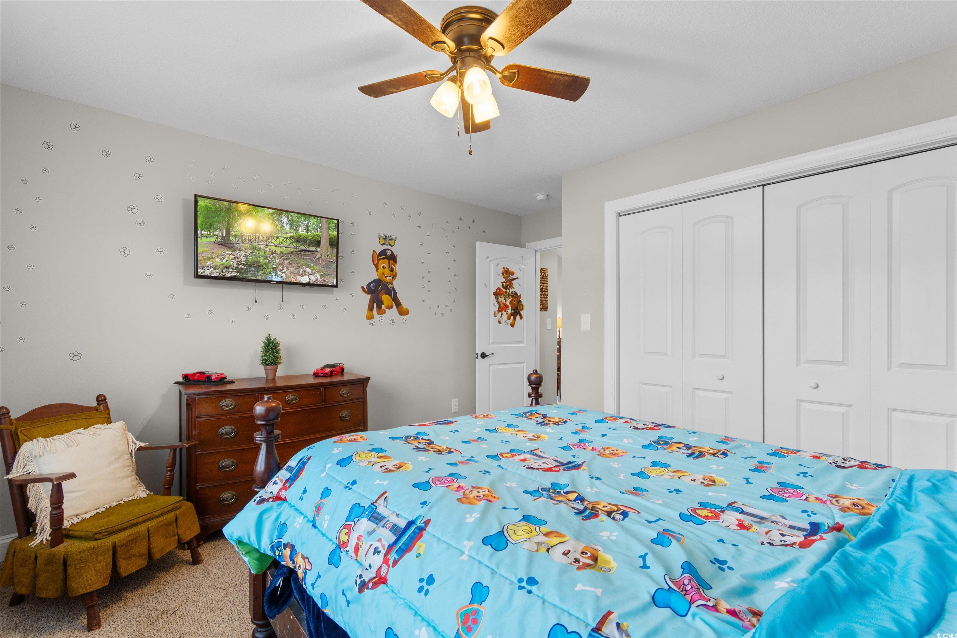 3753 Edwards Road Aynor, SC 29544 - Photo 22 of 38 Carpeted bedroom with a ceiling fan and a closet