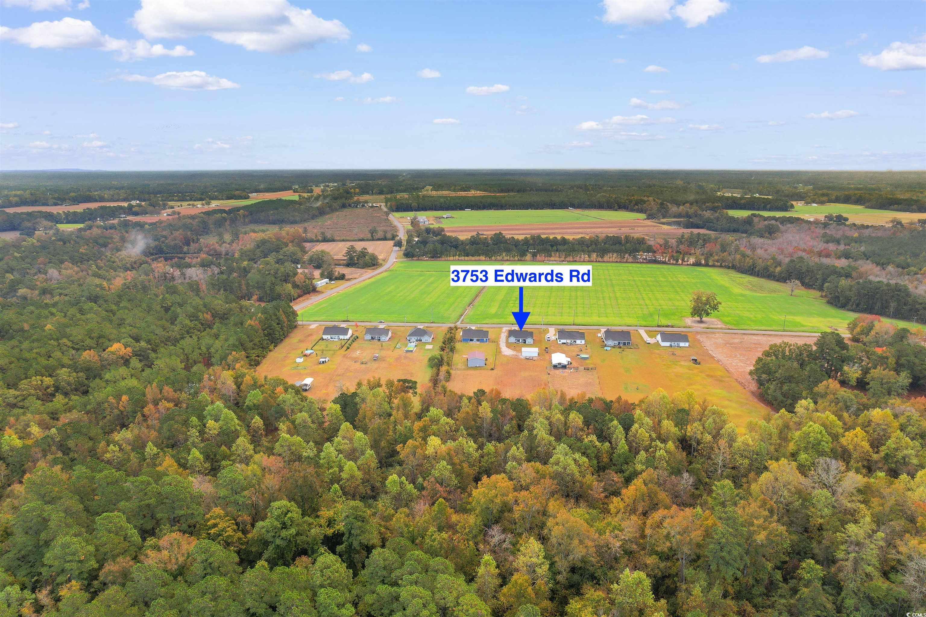 3753 Edwards Road Aynor, SC 29544 - Photo 38 of 38 Aerial view of property's location featuring a heavily wooded area