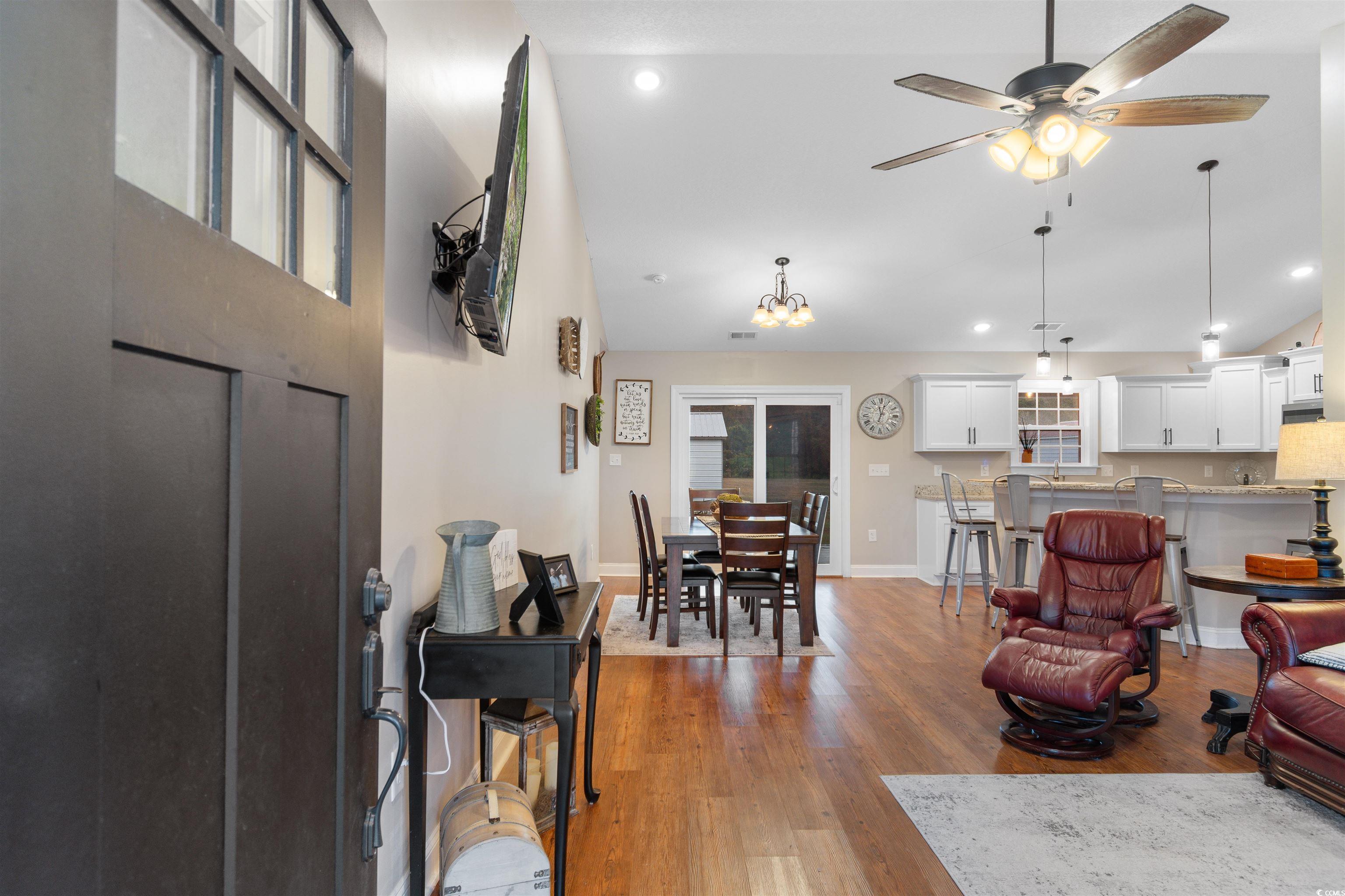 3753 Edwards Road Aynor, SC 29544 - Photo 4 of 38 Living room featuring light wood-type flooring, ceiling fan, a chandelier, recessed lighting, and high vaulted ceiling