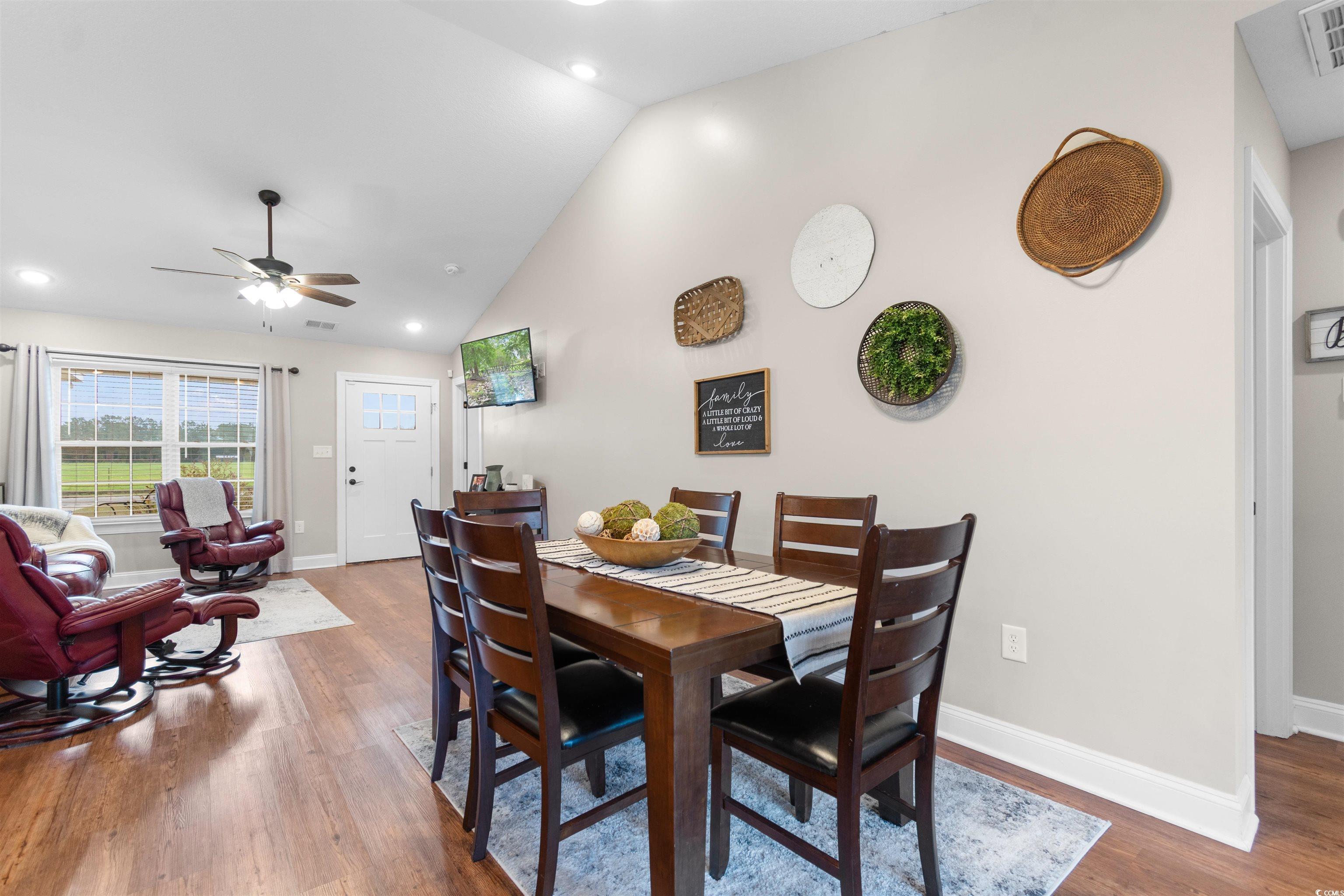 3753 Edwards Road Aynor, SC 29544 - Photo 9 of 38 Dining room featuring dark wood-type flooring, recessed lighting, a ceiling fan, and high vaulted ceiling