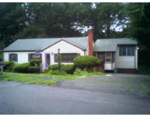 13 Rich Road Woburn, MA 01801 - Photo 1 of 1 a front view of a house with a yard and garage