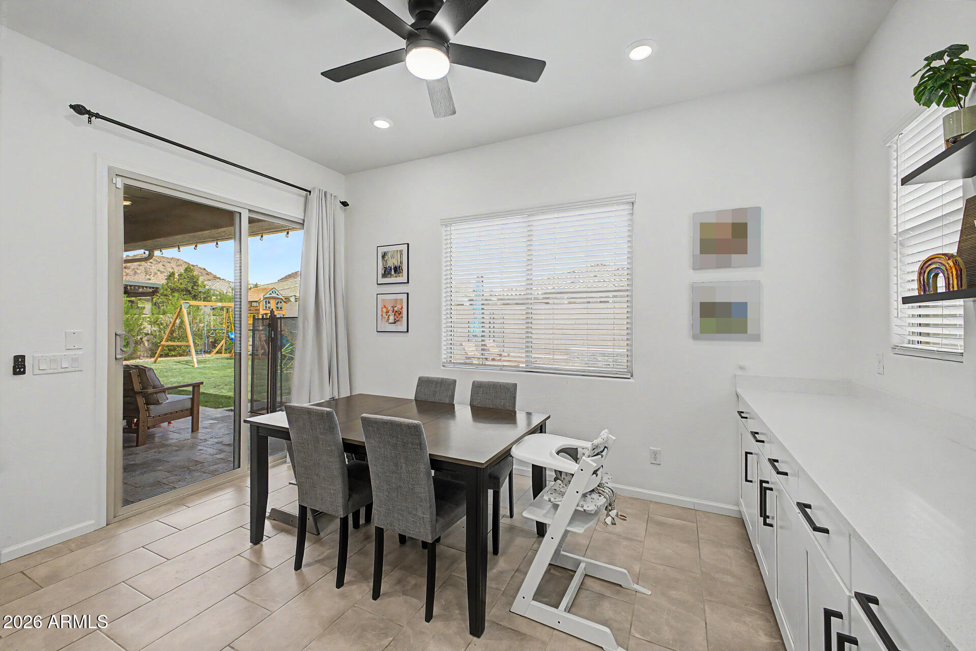 6511 West Steed Ridge Phoenix, AZ 85083 - Photo 9 of 41 a view of a dining room with furniture window and outside view